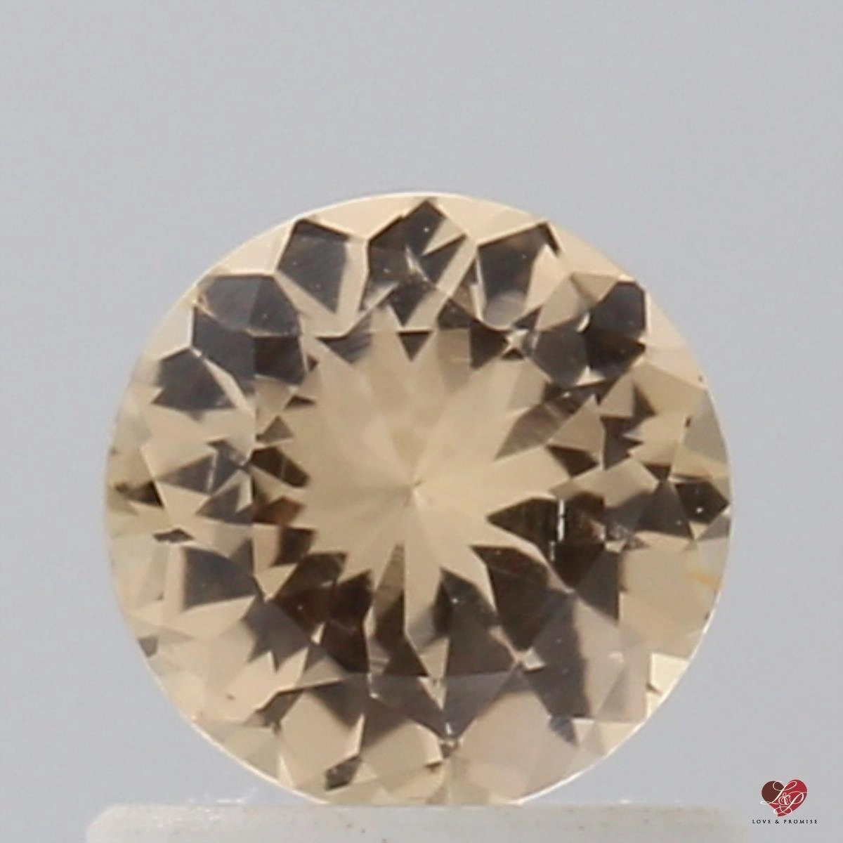 0.72cts Round Peach Blush Sorbet Champagne Sapphire
