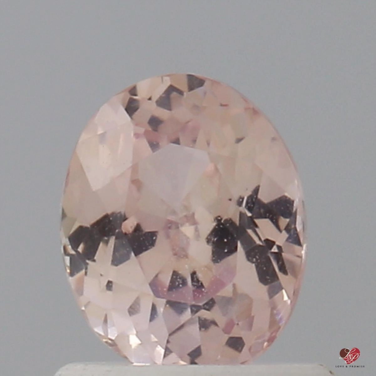 0.96cts Oval Light Peach Blush Champagne Sapphire