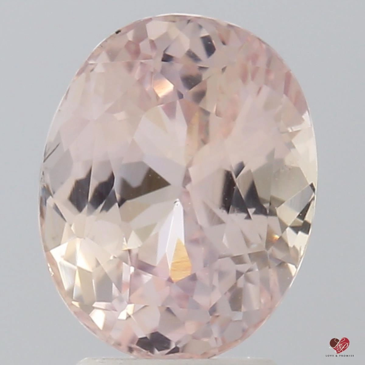 4.28cts Oval Light Peachy Blush Champagne Sapphire